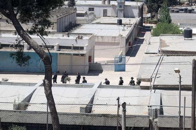 Israeli forces raid UNRWA s Kalendiya Education Center in East Jerusalem JERUSALEM - AUGUST 25 : Israeli forces raid the Qalandia Training Center belonging to the United Nations Relief and Works Agency for Palestine Refugees in the Near East (UNRWA) north of East Jerusalem on August 25, 2026. Israeli forces arrive to evacuate the center block surrounding streets and prevent local residents from approaching. Issam Rimawi Anadolu Jerusalem Palestinian Territory, Occupied. Editorial use only. Please get in touch for any other usage.  Copyright: x2026xAnadoluxIssamxRimawix