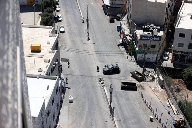 Israeli forces raid UNRWA s Kalendiya Education Center in East Jerusalem JERUSALEM - AUGUST 25 : Israeli forces raid the Qalandia Training Center belonging to the United Nations Relief and Works Agency for Palestine Refugees in the Near East (UNRWA) north of East Jerusalem on August 25, 2026. Israeli forces arrive to evacuate the center block surrounding streets and prevent local residents from approaching. Issam Rimawi Anadolu Jerusalem Palestinian Territory, Occupied. Editorial use only. Please get in touch for any other usage.  Copyright: x2026xAnadoluxIssamxRimawix