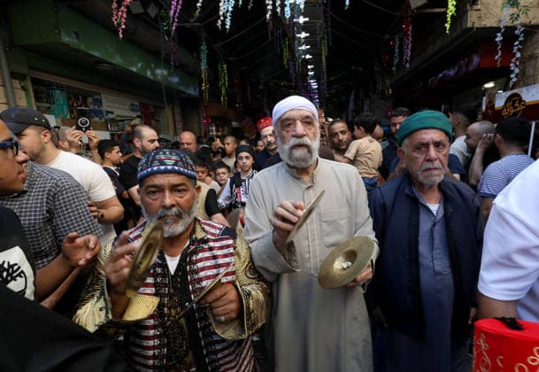 Mawlid al-Nabi in Nablus NABLUS, WEST BANK, PALESTINE - AUGUST 25: Palestinian religious figures and residents take part in a street procession to mark Mawlid al-Nabi, the anniversary of the birth of Prophet Muhammad, in Nablus, West Bank, Palestine on August 25, 2026. Participants wearing traditional clothing chant religious songs accompanied by tambourines and drums during the celebrations. Nedal Eshtayah Anadolu Nablus West Bank. Editorial use only. Please get in touch for any other usage.  Copyright: x2026xAnadoluxNedalxEshtayahx