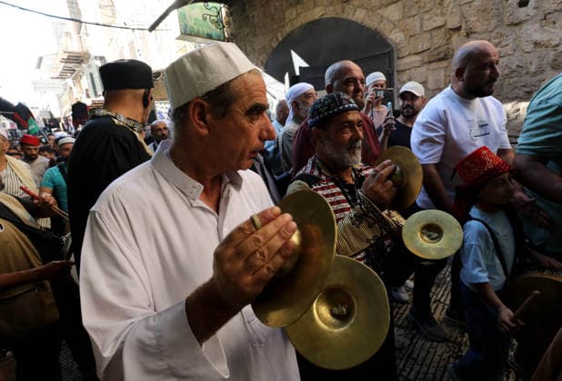 Mawlid al-Nabi in Nablus NABLUS, WEST BANK, PALESTINE - AUGUST 25: Palestinian religious figures and residents take part in a street procession to mark Mawlid al-Nabi, the anniversary of the birth of Prophet Muhammad, in Nablus, West Bank, Palestine on August 25, 2026. Participants wearing traditional clothing chant religious songs accompanied by tambourines and drums during the celebrations. Nedal Eshtayah Anadolu Nablus West Bank. Editorial use only. Please get in touch for any other usage.  Copyright: x2026xAnadoluxNedalxEshtayahx