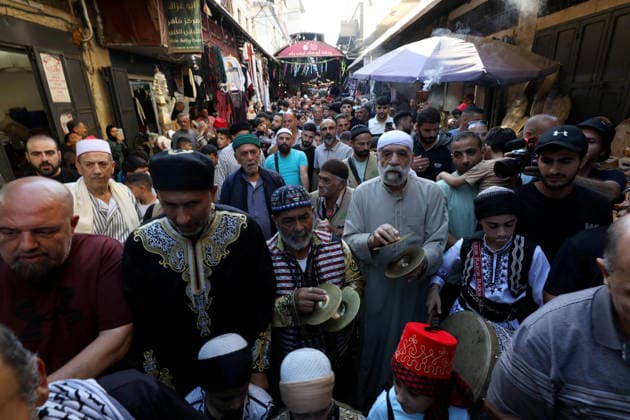 Mawlid al-Nabi in Nablus NABLUS, WEST BANK, PALESTINE - AUGUST 25: Palestinian religious figures and residents take part in a street procession to mark Mawlid al-Nabi, the anniversary of the birth of Prophet Muhammad, in Nablus, West Bank, Palestine on August 25, 2026. Participants wearing traditional clothing chant religious songs accompanied by tambourines and drums during the celebrations. Nedal Eshtayah Anadolu Nablus West Bank. Editorial use only. Please get in touch for any other usage.  Copyright: x2026xAnadoluxNedalxEshtayahx