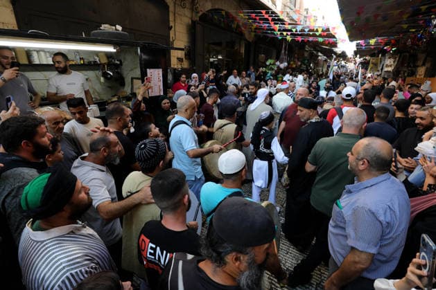 Mawlid al-Nabi in Nablus NABLUS, WEST BANK, PALESTINE - AUGUST 25: Palestinian religious figures and residents take part in a street procession to mark Mawlid al-Nabi, the anniversary of the birth of Prophet Muhammad, in Nablus, West Bank, Palestine on August 25, 2026. Participants wearing traditional clothing chant religious songs accompanied by tambourines and drums during the celebrations. Nedal Eshtayah Anadolu Nablus West Bank. Editorial use only. Please get in touch for any other usage.  Copyright: x2026xAnadoluxNedalxEshtayahx