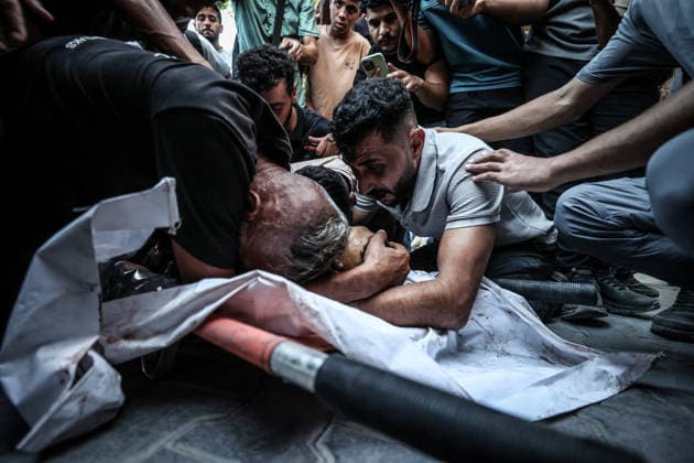 Three Palestinians lost their lives following Israeli attack on Jabalia refugee camp in Gaza GAZA CITY, GAZA, PALESTINE - AUGUST 25: (EDITOR S NOTE: Image depicts death) Relatives of Palestinians, who lost their lives following the Israeli attack on Jabalia refugee camp, mourn as the bodies are brought to al-Shifa Hospital for funeral process in Gaza City, Gaza, Palestine on August 25, 2026. Ali Jadallah Anadolu Gaza City Gaza. Editorial use only. Please get in touch for any other usage.  Copyright: x2026xAnadoluxAlixJadallahx
