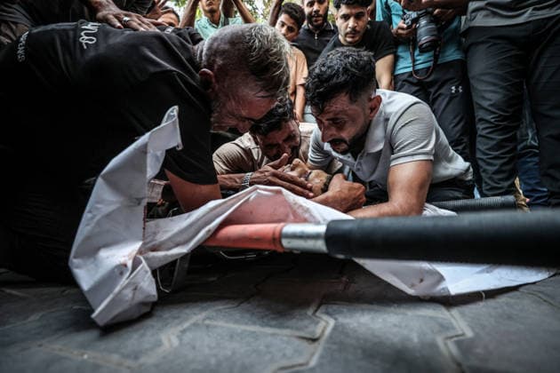 Three Palestinians lost their lives following Israeli attack on Jabalia refugee camp in Gaza GAZA CITY, GAZA, PALESTINE - AUGUST 25: (EDITOR S NOTE: Image depicts death) Relatives of Palestinians, who lost their lives following the Israeli attack on Jabalia refugee camp, mourn as the bodies are brought to al-Shifa Hospital for funeral process in Gaza City, Gaza, Palestine on August 25, 2026. Ali Jadallah Anadolu Gaza City Gaza. Editorial use only. Please get in touch for any other usage.  Copyright: x2026xAnadoluxAlixJadallahx