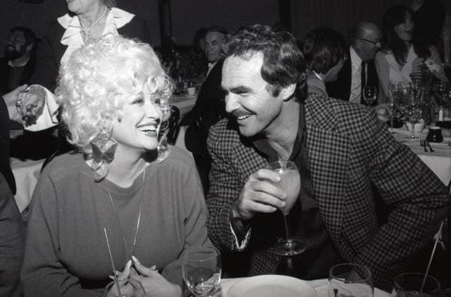 Dolly Parton and Burt Reynolds at La Cage Aux Folles nightclub on November 2, 1981. Copyright: xRalphxDominguez MediaPunchx