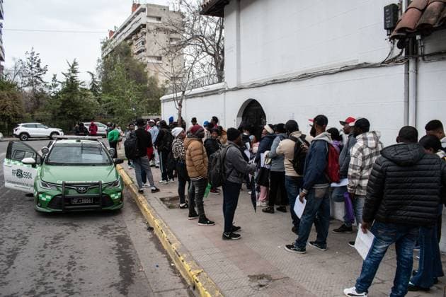 Haitians seek immigration regularization in Santiago SANTIAGO, CHILE, AUGUST 25, 2026: Haitian citizens gather at the Consulate of Haiti in Santiago to complete paperwork related to the regularization of their immigration status in Chile. Santiago Chile Copyright: x xVicentexAsenciox xJNAxPressx