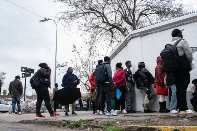 Haitians seek immigration regularization in Santiago SANTIAGO, CHILE, AUGUST 25, 2026: Haitian citizens gather at the Consulate of Haiti in Santiago to complete paperwork related to the regularization of their immigration status in Chile. Santiago Chile Copyright: x xVicentexAsenciox xJNAxPressx