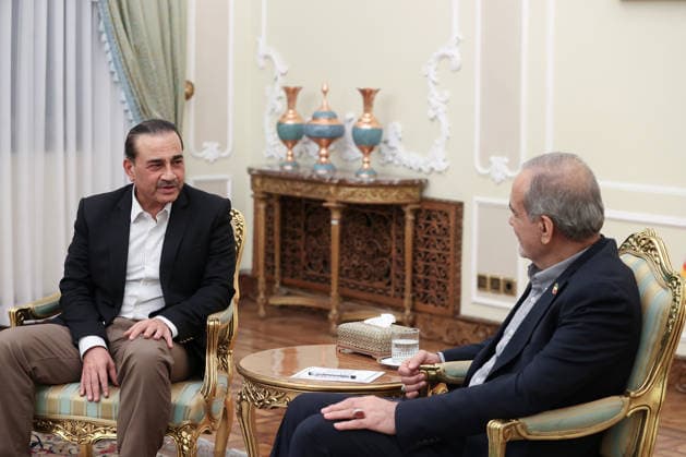 Iranian President Masoud Pezeshkian (R) during a meeting with Pakistan Army Chief Asim Munir (L) in Tehran, Iran, 24 August 2026. Araghchi stated that Iran is holding talks with Pakistani and Omani guests to emphasize regional solutions. In recent weeks, the crisis has escalated in negotiations over the Strait of Hormuz and the ongoing war against Iran.  IRN2026082506 IranianxPresidency