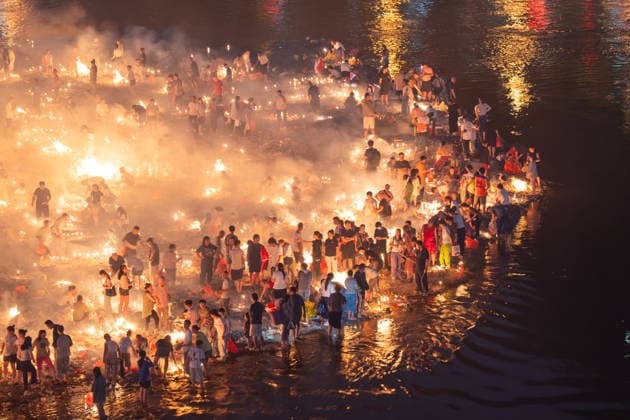 KAILI, CHINA - AUGUST 25: People burn paper offerings in designated areas to pay tribute to their departed loved ones ahead of the Zhongyuan Festival (Ghost Festival) on August 25, 2026 in Kaili, Guizhou Province of China. The Ghost Festival, also known as Zhongyuan Festival, is a traditional festival for paying respect to the dead.  Copyright: xVCGx 111662157012