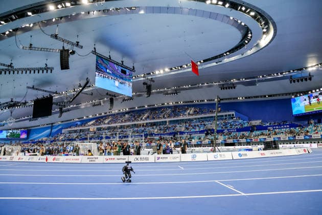 BEIJING, CHINA - AUGUST 25: A robot athlete competes in the 100-meter small group race on day 4 of the 2nd World Humanoid Robot Games at National Speed Skating Oval on August 25, 2026 in Beijing, China.  Copyright: xVCGx 111662143569
