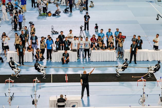 BEIJING, CHINA - AUGUST 25: Humanoid robots compete in a heavyweight tug-of-war match on day 4 of the 2nd World Humanoid Robot Games at National Speed Skating Oval on August 25, 2026 in Beijing, China.  Copyright: xVCGx 111662143571