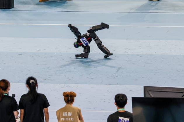 BEIJING, CHINA - AUGUST 25: A humanoid robot compete in the street dance event on day 4 of the 2nd World Humanoid Robot Games at National Speed Skating Oval on August 25, 2026 in Beijing, China.  Copyright: xVCGx 111662143573