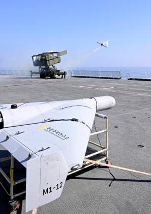 Combat test of suicide drone in S. Korea Combat test of suicide drone in S. Korea A suicide attack drone is launched from the 14,000-ton Marado amphibious assault ship in waters off the southern port city of Busan on Aug. 25, 2026. The Navy was forced to abort the combat test of a loitering munition, as the drone, set to strike a target boat nearby, plunged into the sea shortly after the launch. (Yonhap) 2026-08-26 12:24:47 < 1980-2026 YONHAPNEWS AGENCY. .> ºÎ»ê±¤¿ª½Ã EDITORIAL USE ONLY  Copyright: xx PYH2026082610030031500 YonhapxNewsx yonphotos255995
