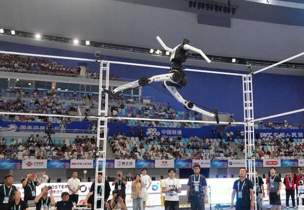BEIJING, CHINA - AUGUST 25: A robot competes in the Standing High Jump final on day 4 of the 2nd World Humanoid Robot Games at National Speed Skating Oval on August 25, 2026 in Beijing, China.  Copyright: xVCGx 111662240483