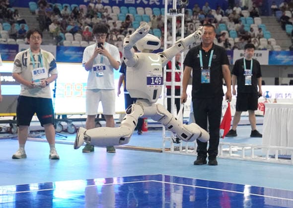 BEIJING, CHINA - AUGUST 25: A robot competes in the Standing High Jump final on day 4 of the 2nd World Humanoid Robot Games at National Speed Skating Oval on August 25, 2026 in Beijing, China.  Copyright: xVCGx 111662240490