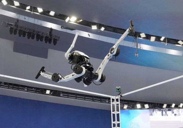 BEIJING, CHINA - AUGUST 25: A robot competes in the Standing High Jump final on day 4 of the 2nd World Humanoid Robot Games at National Speed Skating Oval on August 25, 2026 in Beijing, China.  Copyright: xVCGx 111662240492