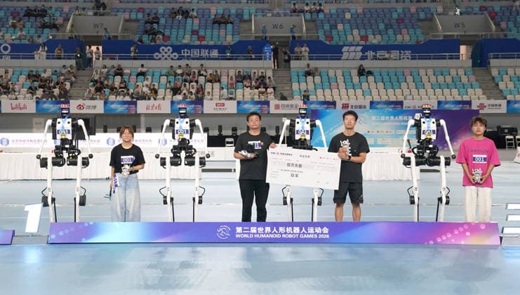 BEIJING, CHINA - AUGUST 25: Members of Team Tiangong Ultra celebrate during the award ceremony after robots winning the 4x100 meter relay final on day 4 of the 2nd World Humanoid Robot Games at National Speed Skating Oval on August 25, 2026 in Beijing, China.  Copyright: xVCGx 111662238725