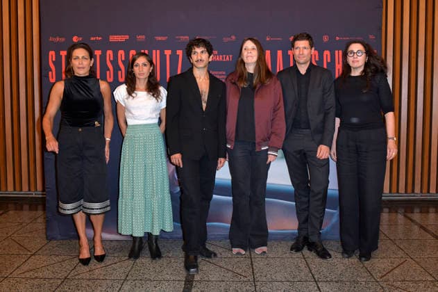 Shila Behjat, Gilda Sahebi, Faraz Shariat, Claudia Schaefer, Ronen Steinke, and Seda Basay Yildiz at the special screening of the film *Staatsschutz* at Kino International in Berlin, August 25, 2026 Foto:xM.xBehrensx xFuturexImagex staatsschutz_6847