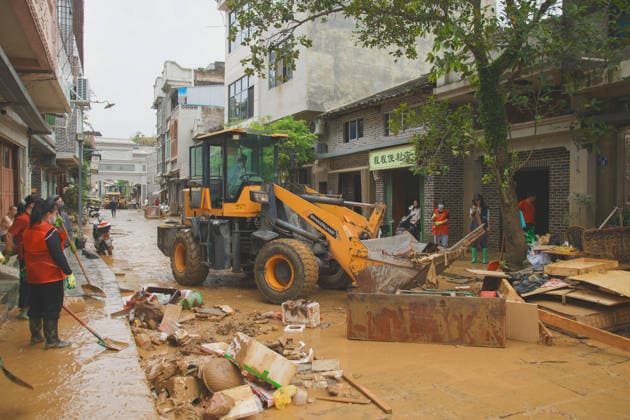 CHONGZUO, CHINA - AUGUST 26: Residents clear mud to restore production and daily life as floodwaters recede on August 26, 2026 in Longzhou County, Chongzuo City, Guangxi Zhuang Autonomous Region of China. The area was hit by floods caused by heavy rainfall from Typhoon Narra and upstream water flow.  Copyright: xChinaxNewsxServicex 111662262385