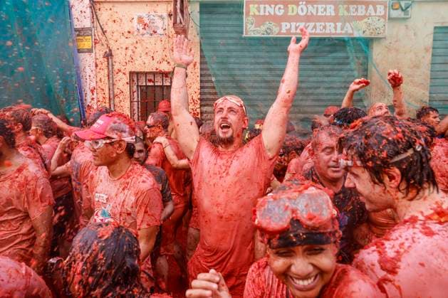 Celebration of La Tomatina in Bunol, Valencia, 2026 Several participants in the La Tomatina festival in Bunol celebrate during the event on August 26, 2026, in Bunol, Valencia, Valencian Community, Spain. La Tomatina is always held on the last Wednesday of August, as part of Bunol’s festival week, and involves participants throwing tomatoes at one another. Seven trucks were needed to transport the 150,000 kilos of tomatoes that were thrown in this unique battle, which this year celebrates its 79th anniversary. AUGUST 26, 2026 FESTIVAL TRADITION CULTURE Bunol, Valencia, Valencian Community Bunol, Valencia, Valencian Community, Spain  Copyright: xRoberxSolsonax 7732785