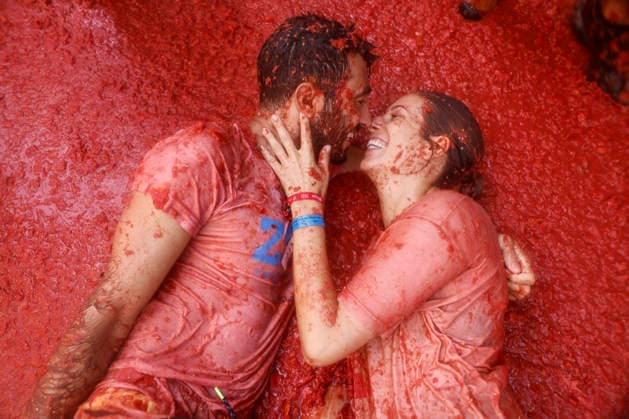 Celebration of La Tomatina in Bunol, Valencia, 2026 Several participants in the La Tomatina festival in Bunol celebrate during the event on August 26, 2026, in Bunol, Valencia, Valencian Community, Spain. La Tomatina is always held on the last Wednesday of August, as part of Bunol’s festival week, and involves participants throwing tomatoes at one another. Seven trucks were needed to transport the 150,000 kilos of tomatoes that were thrown in this unique battle, which this year celebrates its 79th anniversary. AUGUST 26, 2026 FESTIVAL TRADITION CULTURE Bunol, Valencia, Valencian Community Bunol, Valencia, Valencian Community, Spain  Copyright: xRoberxSolsonax 7732786