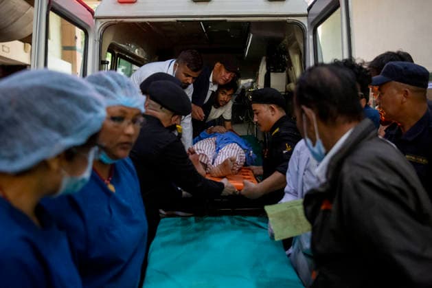 (260826) -- KATHMANDU, Aug. 26, 2026 -- A person injured in a massive flash flood in north Nepal is taken to a hospital in Kathmandu, Nepal, Aug. 26, 2026. At least 95 people were killed and 484 others remain missing in a massive flash flood in north Nepal on Wednesday, the Office of the Prime Minister said. (Photo by Xinhua) (SpotNews) NEPAL-FLASH FLOODS-AFTERMATH SulavxShrestha 