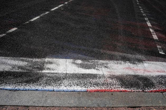 Leftover paint from a the Freedom 250 Grand Prix track is seen along Pennsylvania Avenue in Washington, DC on Wednesday, August 26, 2026. The Freedom 250 Grand Prix took place last weekend gathered thousands around a 1.7 mile course around Washington s landmarks.  WAP20260826324 BONNIExCASH