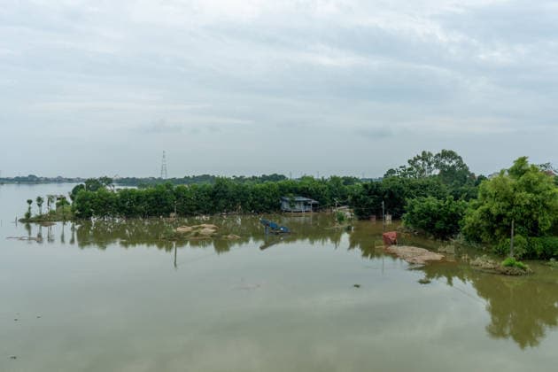 Flooding disrupts life along Vietnam’s riverbanks AN LAC, VIETNAM - AUGUST 26: Floodwaters surround villages along the Cau River after it overflowed following heavy rainfall in An Lac, northern Vietnam on August 26, 2026. Many residents in affected areas have been evacuated as rising water levels inundated homes, roads and agricultural land, leaving some communities partially or completely submerged. Magdalena Chodownik Anadolu An Lac Vietnam. Editorial use only. Please get in touch for any other usage.  Copyright: x2026xAnadoluxMagdalenaxChodownikx