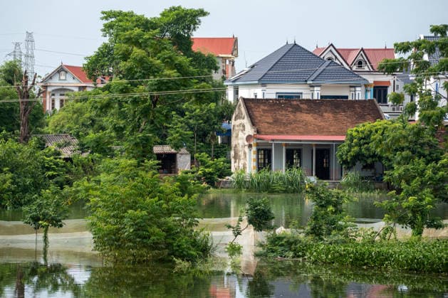 Flooding disrupts life along Vietnam’s riverbanks AN LAC, VIETNAM - AUGUST 26: Floodwaters surround villages along the Cau River after it overflowed following heavy rainfall in An Lac, northern Vietnam on August 26, 2026. Many residents in affected areas have been evacuated as rising water levels inundated homes, roads and agricultural land, leaving some communities partially or completely submerged. Magdalena Chodownik Anadolu An Lac Vietnam. Editorial use only. Please get in touch for any other usage.  Copyright: x2026xAnadoluxMagdalenaxChodownikx