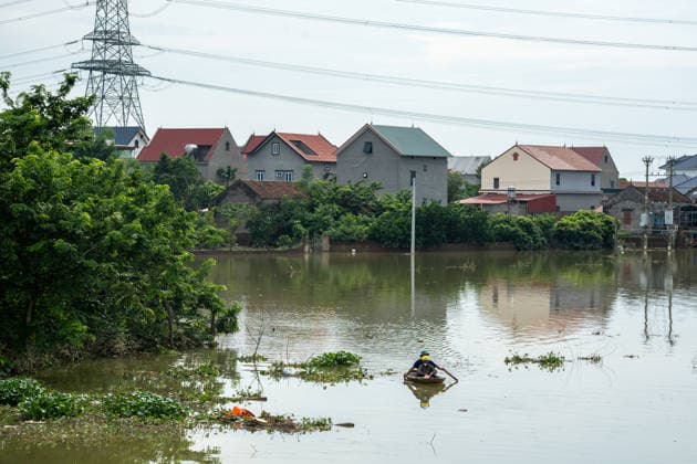 Flooding disrupts life along Vietnam’s riverbanks AN LAC, VIETNAM - AUGUST 26: Floodwaters surround villages along the Cau River after it overflowed following heavy rainfall in An Lac, northern Vietnam on August 26, 2026. Many residents in affected areas have been evacuated as rising water levels inundated homes, roads and agricultural land, leaving some communities partially or completely submerged. Magdalena Chodownik Anadolu An Lac Vietnam. Editorial use only. Please get in touch for any other usage.  Copyright: x2026xAnadoluxMagdalenaxChodownikx