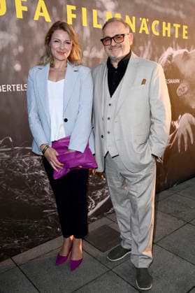 Michael Trischan with his companion at the opening reception for the 2026 UFA Film Nights on the rooftop terrace of the Bertelsmann Berlin office, August 26, 2026 Foto:xN.xKubelkax xFuturexImagex ufa_6774