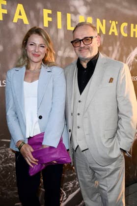 Michael Trischan with his companion at the opening reception for the 2026 UFA Film Nights on the rooftop terrace of the Bertelsmann Berlin office, August 26, 2026 Foto:xN.xKubelkax xFuturexImagex ufa_6775
