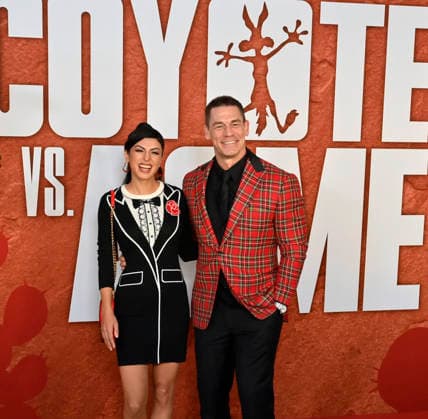 Cast member John Cena and his wife Shay Shariatzadeh attend Ketchup Entertainment s premiere of the animated quirky comedy Coyote vs. Acme at the Westwood Village Theater in Los Angeles on Wednesday, August 26, 2026. Storyline: A story set in the ACME warehouse, the manufacturer of anything and everything used by the Looney Tunes characters.  LAP2026082601 JIMxRUYMEN