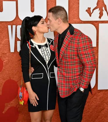 Cast member John Cena and his wife Shay Shariatzadeh attend Ketchup Entertainment s premiere of the animated quirky comedy Coyote vs. Acme at the Westwood Village Theater in Los Angeles on Wednesday, August 26, 2026. Storyline: A story set in the ACME warehouse, the manufacturer of anything and everything used by the Looney Tunes characters.  LAP2026082604 JIMxRUYMEN