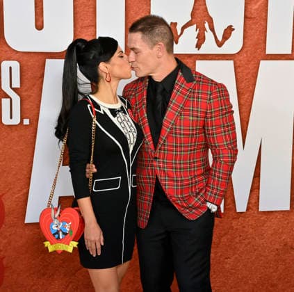 Cast member John Cena and his wife Shay Shariatzadeh attend Ketchup Entertainment s premiere of the animated quirky comedy Coyote vs. Acme at the Westwood Village Theater in Los Angeles on Wednesday, August 26, 2026. Storyline: A story set in the ACME warehouse, the manufacturer of anything and everything used by the Looney Tunes characters.  LAP2026082626 JIMxRUYMEN