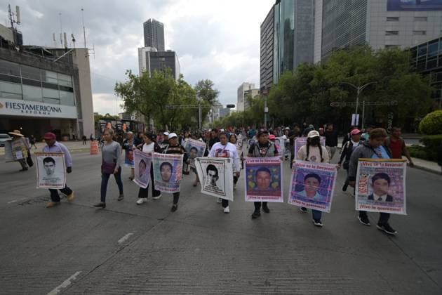 Families march in Mexico City ahead of 12th anniversary of Ayotzinapa disappearances MEXICO CITY, MEXICO AUGUST 26, 2026: Relatives of the 43 missing students from the Ayotzinapa Rural Teachers™ College, joined by students and activists, march from the Angel of Independence toward the Hemiciclo a Benito Juarez in Mexico City on August 26, 2026. The demonstration, held as part of the 143 Accion Global por Ayotzinapa y MÃ xico, took place one month before the 12th anniversary of the disappearance of the 43 students in Guerrero in September 2014. Ciudad de MÃ xico Mexico Copyright: x xAlbertoxRoax xJNAxPressx