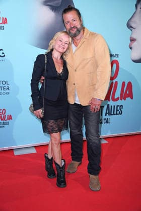 Dorkas Kiefer with her husband Sascha Hauck at the musical premiere of *ROMEO JULIA LIEBE IST ALLES* at the Capitol Theater in Düsseldorf on August 27, 2026