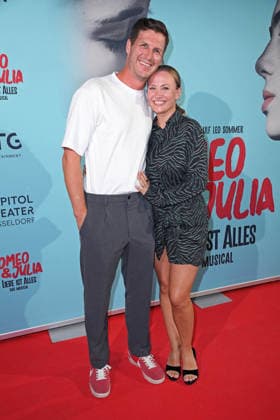 Ania Niedieck with her husband Chris Hecker at the musical premiere of *ROMEO JULIA: LOVE IS EVERYTHING* at the Capitol Theater in Düsseldorf on August 27, 2026