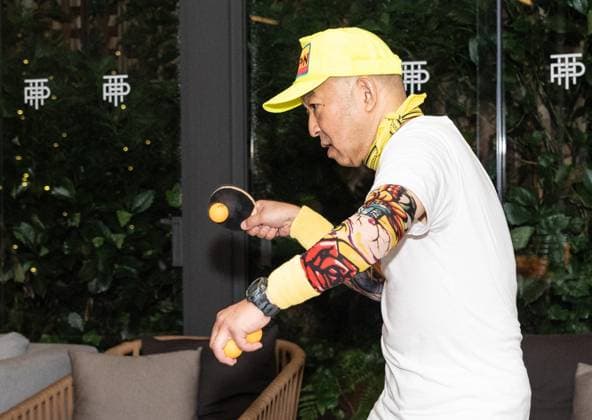 August 27, 2026, Bronx, New York, USA: Kazuyuki Yokoyama aka Kaz The Kazmanian Devil plays an exhibition game of table tennis with elite big tennis players and guests during Game. Set. Spin event ahead of US Open Championship at Park Terrace Hotel in New York, NY on August 27, 2026. He was joined by Belinda Bencic, Tomas Martin Etcheverry, Martin Damm and Giovanni Mpetshi Perricard Bronx USA - ZUMAr339 20260827_znp_r339_024 Copyright: xLevxRadinx