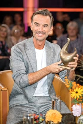 MDR Riverboat host, singer, and actor Florian Silbereisen receives the Golden Hen award during the taping of the MDR talk show Riverboat on August 28, 2026, at Mediacity Leipzig 20260828SFL0020