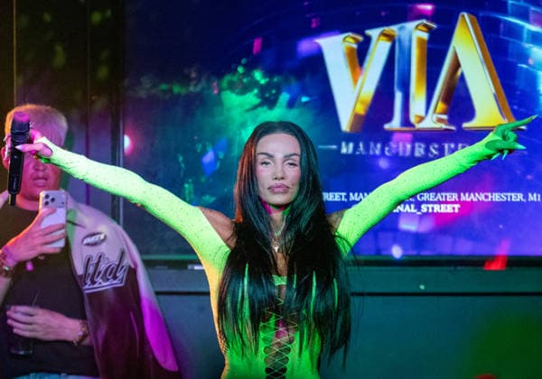 Kate Price at Manchester Village Pride 2026 in Manchester, UK - 28 Aug 2026 Model turned singer, Katie Price commands the stage in a vibrant yellow bodysuit during a provocative performance at Via Manchester on Canal Street for the inaugural Manchester Village Pride 2026. The reality TV icon teased the packed crowd, playing with her hair and striking dramatic poses in the sweltering heat of the venue, pausing occasionally for drags from her vape and sips of her drink. Delivering an interactive set, Price invited excited members of the audience onto the stage to sing along with her, leaving several fans visibly emotional as they shared the microphone with the star. Manchester United Kingdom Copyright: xGaryxRobertsx xSOPAxImagesx GROBERTS-25