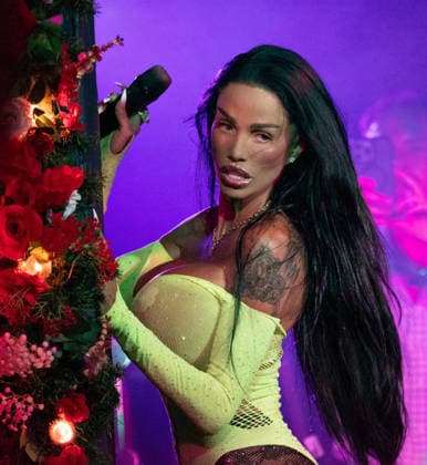 August 28, 2026, Manchester, United Kingdom: Model turned singer, Katie Price commands the stage in a vibrant yellow bodysuit during a provocative performance at Via Manchester on Canal Street for the inaugural Manchester Village Pride 2026. The reality TV icon teased the packed crowd, playing with her hair and striking dramatic poses in the sweltering heat of the venue, pausing occasionally for drags from her vape and sips of her drink. Delivering an interactive set, Price invited excited members of the audience onto the stage to sing along with her, leaving several fans visibly emotional as they shared the microphone with the star. Manchester United Kingdom - ZUMAs197 20260828_aaa_s197_168 Copyright: xGaryxRobertsx