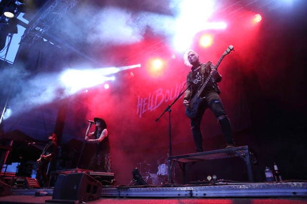 Vulture King, Matteo vDiva Fabbiani, Jan Hangman, and Raul Sanchez (from left to right), from the band Hell Boulevard, performing as the opening act for Mono Inc. at an open-air concert at the Waschhaus in Potsdam on August 28, 2026. Hell Boulevard Concert in Potsdam
