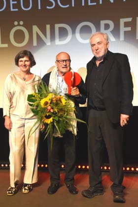 Film Return to Montauk Daniela Goetz, Festival Director; Volker Schlöndorff, Director; Ludwigshafen Film Festival; Dr. Michael Goetz, Honorary Award Recipient; Laudator, Festival Director, Ludwigshafen, August 28, 2026, on the banks of the Rhine, 22nd German Film Festival 2026; Photo: Ludwigshafen