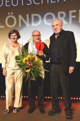Film Return to Montauk Daniela Goetz, Festival Director; Volker Schlöndorff, Director; Ludwigshafen Film Festival; Dr. Michael Goetz, Honorary Award Recipient; Laudator, Festival Director, Ludwigshafen, August 28, 2026, on the banks of the Rhine, 22nd German Film Festival 2026; Photo: Ludwigshafen