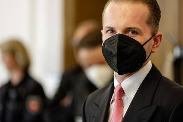 Wind Power Fraudster Hendrik Holt Wind power fraudster Hendrik Holt, who is wearing a black FFP2 mask due to the COVID-19 pandemic, is waiting on May 12, 2022, for