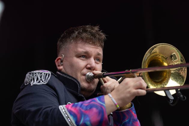 Druckluft at the Oh wie schön Festival on the Kunst Rasen in Bonn, August 29, 2026. Trombonist and singer Florian HERTEL. Druckluft. The Bonn-based brass and performance band Druckluft during an open-air live performance on the Kunst Rasen in Bonn, Bonn-Gronau, North Rhine-Westphalia, Germany Copyright: xMarcxJohnx