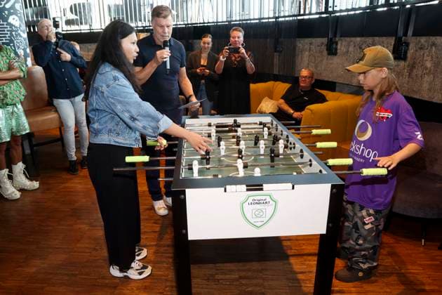 ABB HERZKICKEN: Emil, Linh Tran, at the foosball table during a press conference for the Kicken mit Herz charity event at Restaurant Karo Paul in the Bunker at Feldstrasse 27, AUGUST 2026, in Hamburg, Germany