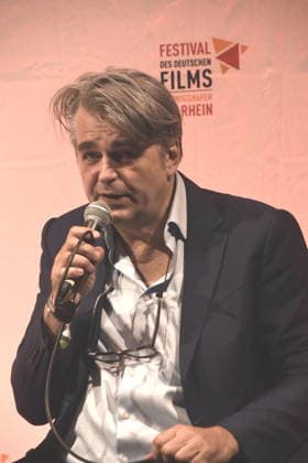 Film Discussion: Return to Montauk by Rüdiger Schsland; Moderator: Ludwigshafen, August 28, 2026, on the banks of the Rhine, 22nd German Film Festival 2026; Photo: Ludwigshafen
