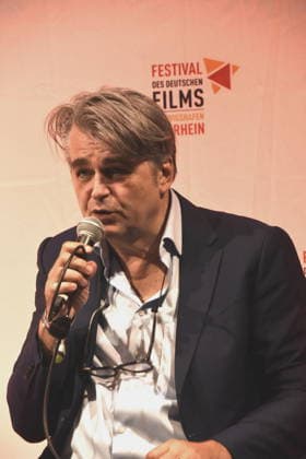 Film Discussion: Return to Montauk by Rüdiger Schsland; Moderator: Ludwigshafen, August 28, 2026, on the banks of the Rhine, 22nd German Film Festival 2026; Photo: Ludwigshafen